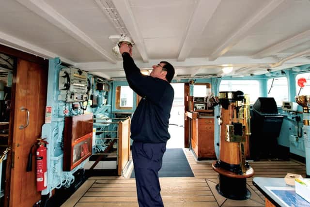 Maintenance manager Tony Smith keeps the yacht ship shape year round.