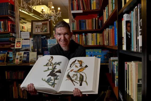 Assistant manager 
Euan Stevenson with Audubon's Birds of America. Picture: Julie Bull