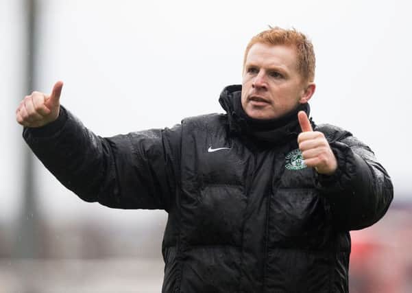 Neil Lennon gives the Hibs fans a huge thumbs-up after the win over Falkirk. Pic: SNS