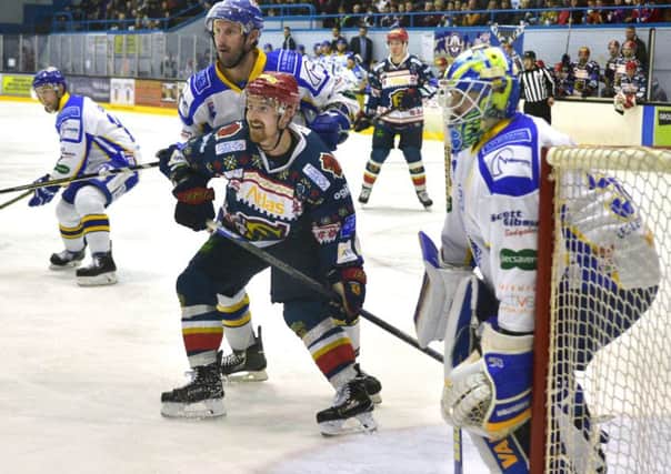 Capitals' Matt Tipoff, waiting for the pass, gets close attention from Fife's Phillipe Paquet. Picture: Jan Orkisz/SMP