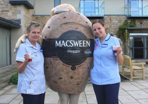 St Columbas Hospice nurses Helen Ramsay (L) and Rachel Gillies (R) with Hamish the Haggis