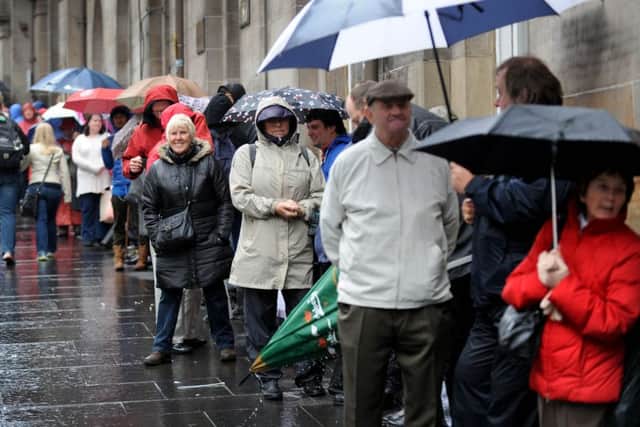 People queue for tickets to the Edinburgh Tattoo preview performance.
Picture; Jane Barlow