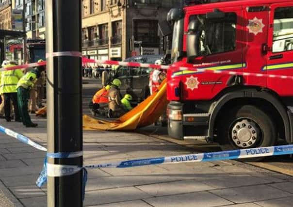 Emergency services at the scene on Princes Street. Picture; Lewis Bryce