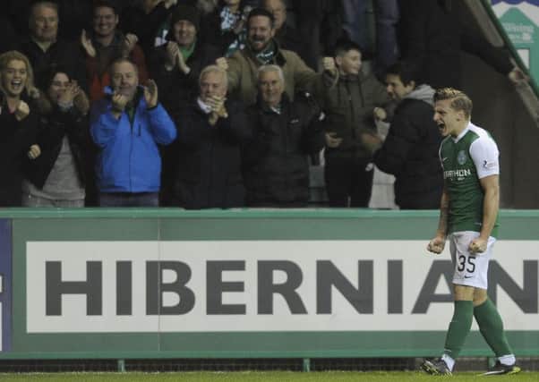 Jason Cummings celebrates in front of home fans after scoring the second goal. Picture: Neil Hanna