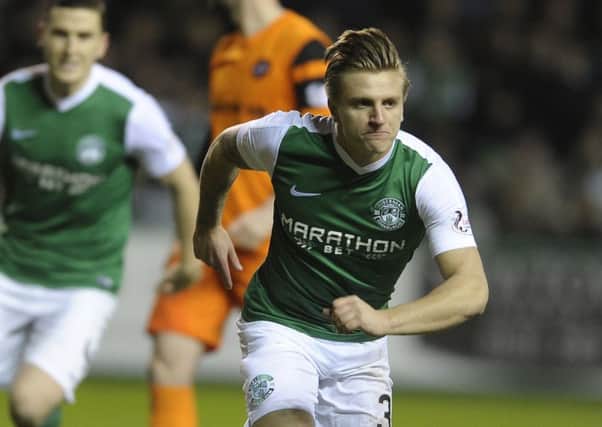 Jason Cummings scored twice for Hibs against Dundee United on Friday night. Pic: Neil Hanna