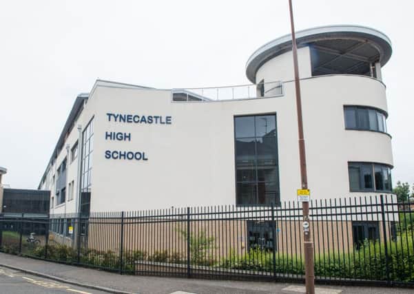 Armed police gathered at Tynecastle HS before the raid