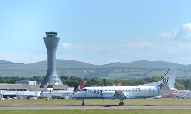 A Flybe flight leaves Edinburgh

. Picture; 
Neil Hanna