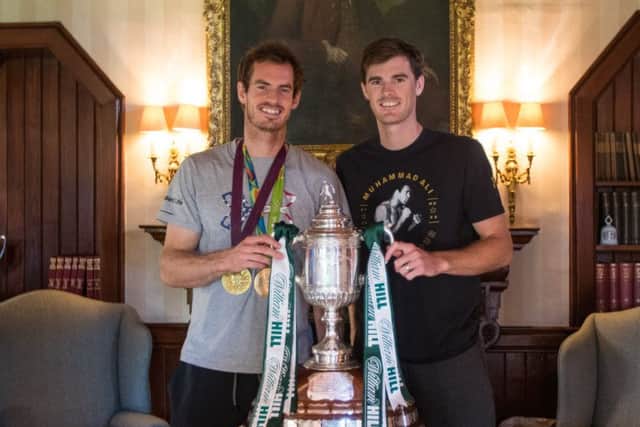 Jamie and Andy Murray with the Scottish Cup Trophy. Picture: contributed