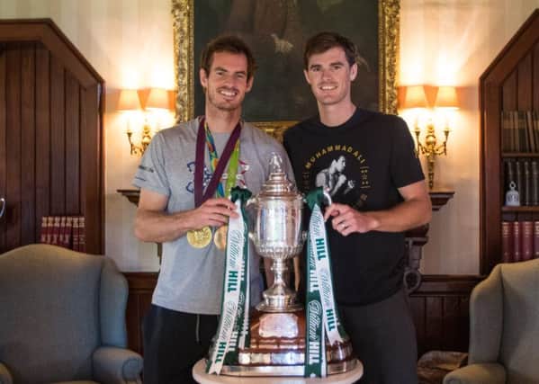 Jamie and Andy Murray with the Scottish Cup Trophy. Picture: contributed