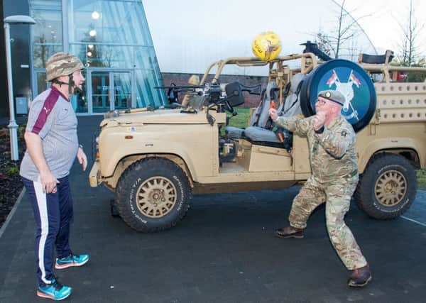 Hearts Legends will take on Army Legends in a match at Oriam on Sunday, March 5 at 4pm. The game will be non-ticketed with a bucket collection in aid of The Soldiers Charity. John Robertson is pictured playing some head tennis with Cpl Derek Ward. Pic: Ian Georgeson