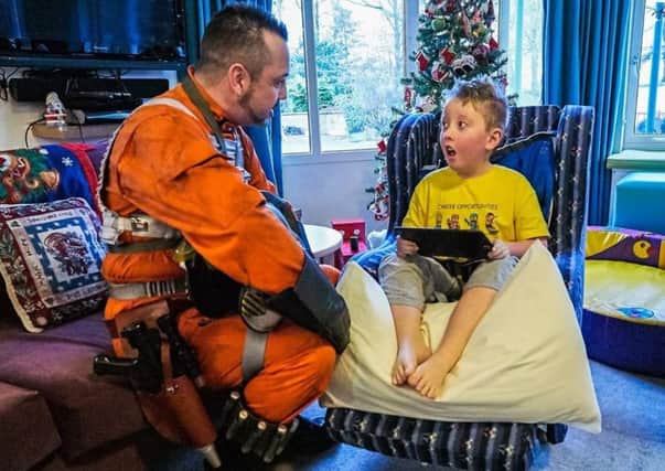 Keith Armour visits Rachel House dressed as a Star Wars rebel fighter
