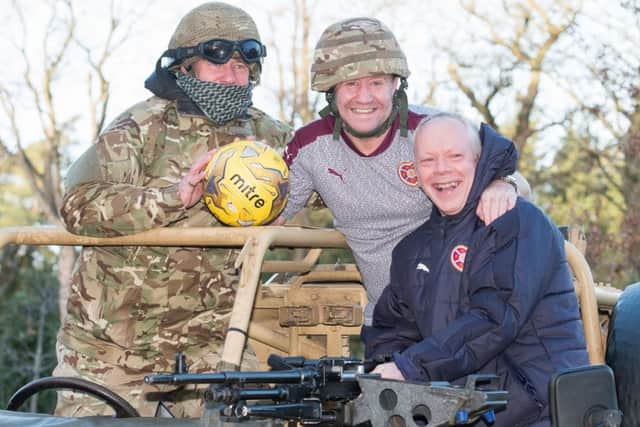 Jimmy Sandison, right, and John Robertson, centre, help too promote a Hearts Legends v Army Legends charity match at Oriam on Sunday, March 5