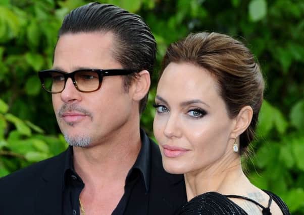 The question of how Brad and Angelina will divide up their towels must be buried under a mountain of paperwork. Picture: Getty