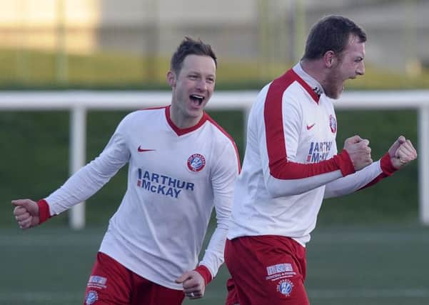 David Greenhill rushes to congratulate Spartans team-mate Keith Murray on his goal. Pic: Neil Hanna