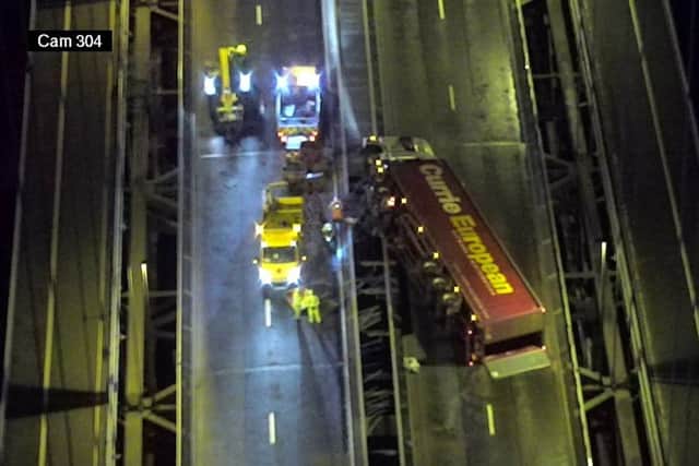 Handout picture from Amey showing a lorry blown over in strong winds on the Forth Road Bridge.