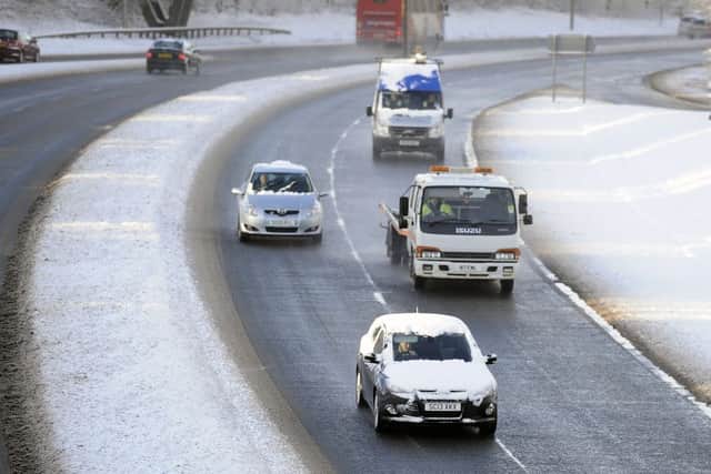Heavy snow showers have caused delays. Picture; Michael Gillen