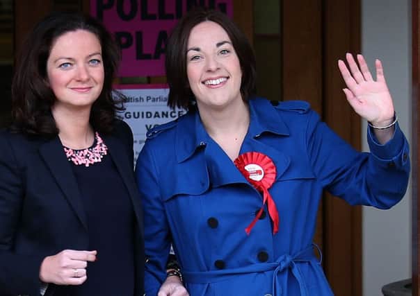 Kezia Dugdale (right) arrives with partner Louise Riddell at a polling station to cast her vote in last year's Scottish Parliament election.