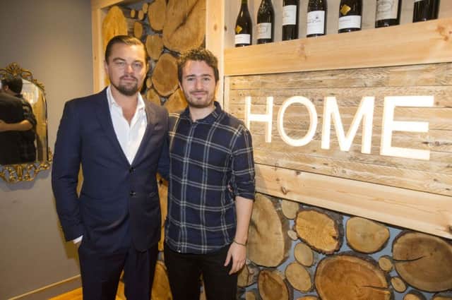 Leonardo DiCaprio poses with social entrepreneur Josh Littlejohn at Social Bite restaurant, Home. Picture: Getty