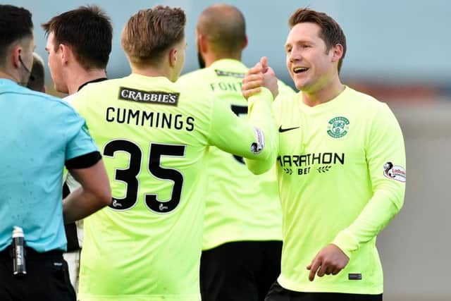 Jason Cummings congratulates Kris Commons on his opening goal for Hibs against Dumbarton
