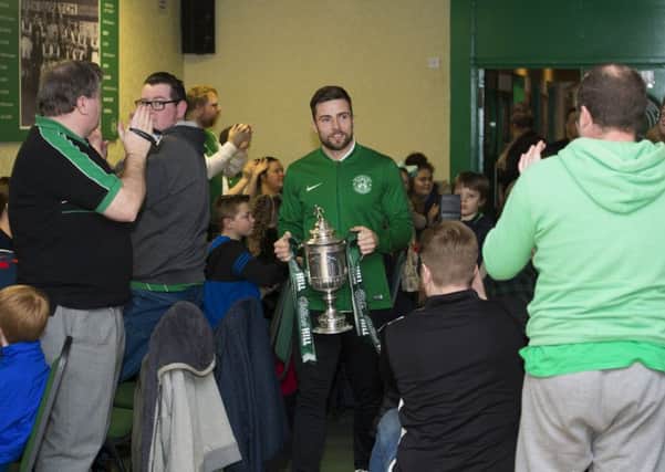 Lewis Stevenson joins fans as he celebrates the end of the Preserved Scottish Cup Trophy Tour at the Hibs Supportera' Club