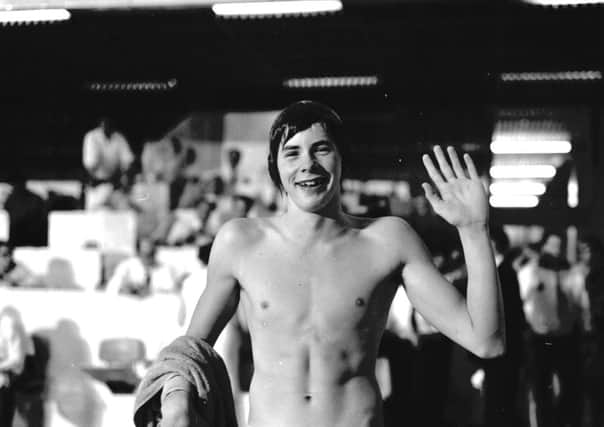 Scottish swimmer David Wilkie celebrates after beating his 200 m breast stroke record during the Commonwealth Games in Edinburgh, July 1970.