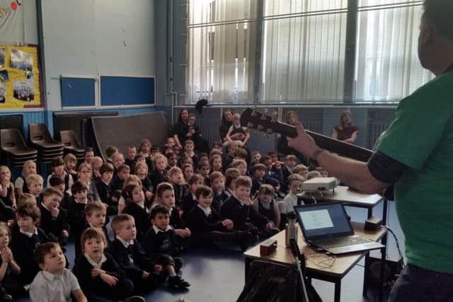 Gerry sings  The Litter Song with the P1s and P2s at Leith Primary