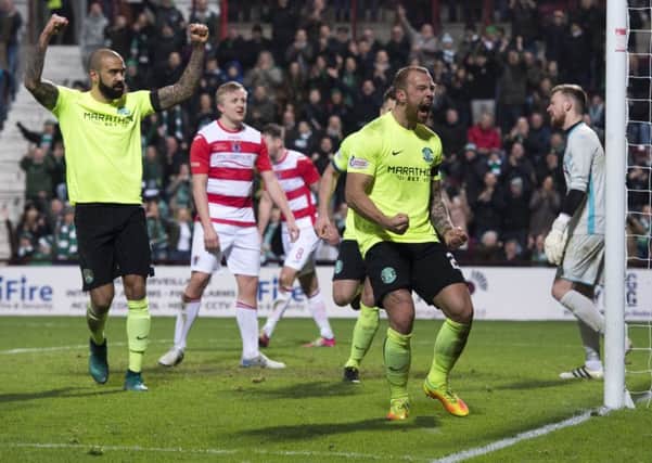 Jordon Forster 
celebrates after wrapping up the scoring with the eighth goal, is first in two-and-a-half years for Hibs