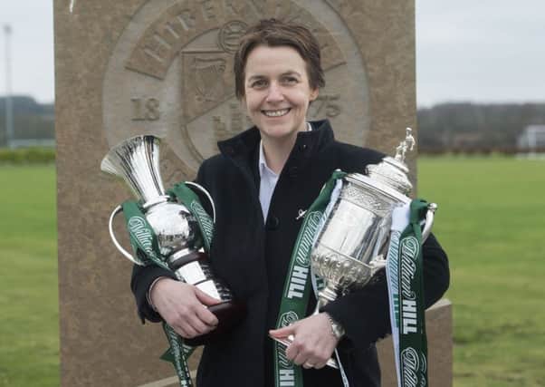 Leeanne Dempster is pictured with the Commemorative Cup, which recognises winners of the Scottish Cup