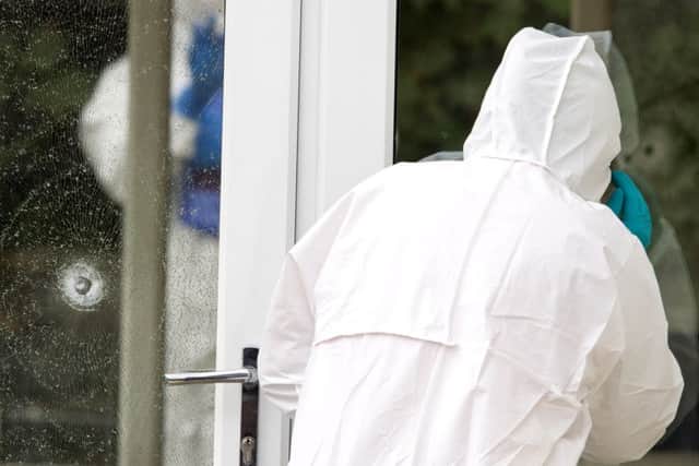 Police Forensic officers at Ratho Station after a shooting incident.  Picture Ian Rutherford