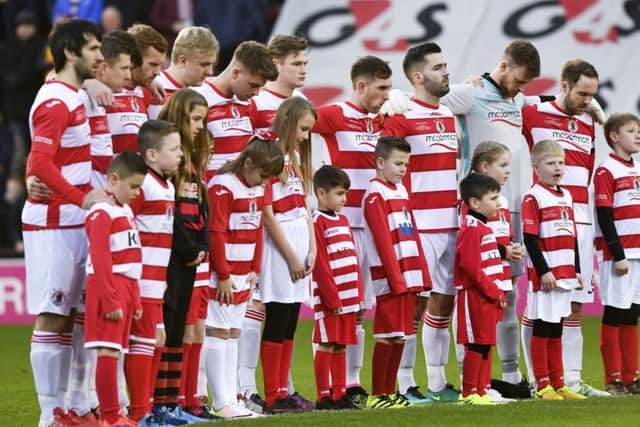 The Bonnyrigg Rose players observe a minute's silence for former player Shaun Woodburn. Picture: Alan Harvey/SNS