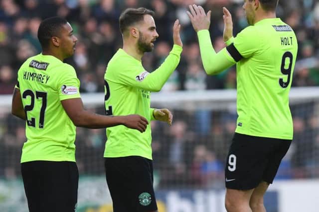 Andrew Shinnie (centre) is congratulated by Chris Humphrey and Grant Holt on his opening goal against Bonnyrigg Rose at Tynecastle