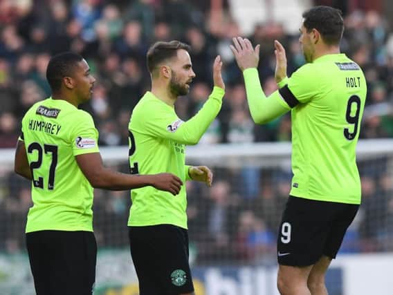Andrew Shinnie (centre) is congratulated by Chris Humphrey and Grant Holt on his opening goal against Bonnyrigg Rose at Tynecastle