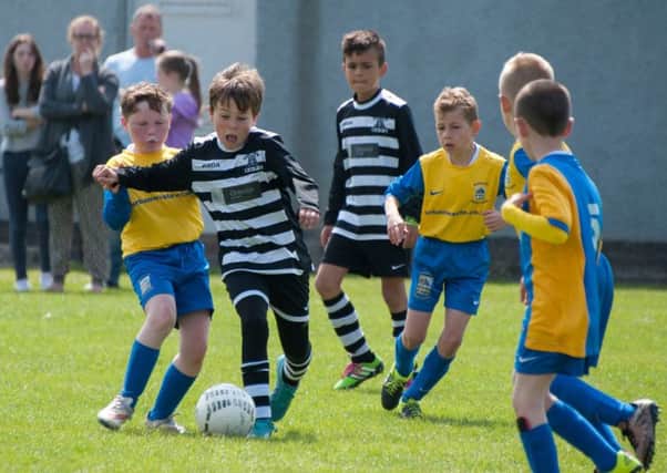 City of Edinburgh Council  have been urged to drop charges for after-school sports after it emerges pupils in Glasgow enjoy theirs for free  Pic: Andrew O'Brien