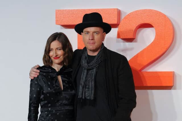 Ewan McGregor and Kelly Macdonald pose on the orange carpet. Picture: Getty
