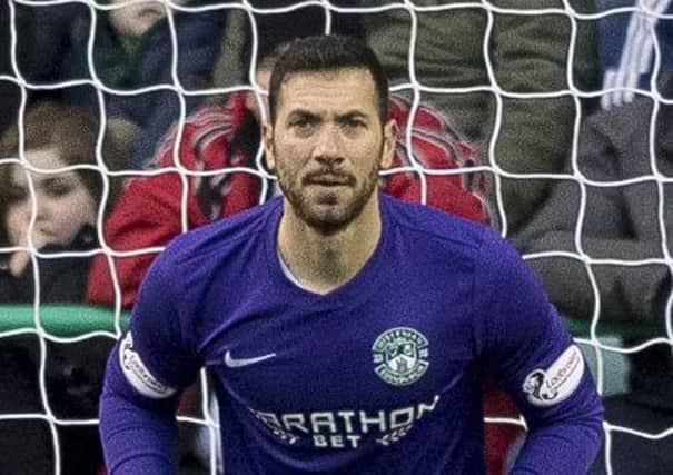 Hibs goalkeeper Ofir Marciano was relieved to avoid a broken rib