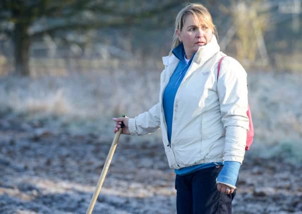 Nicola Urquhart searching for her son Corrie McKeague near Bury St Edmonds. Picture: SWNS