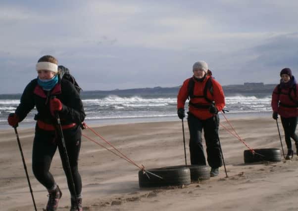 Polar Academy expedition training with tyres on St Andrews beach. Picture: The Polar Academy
