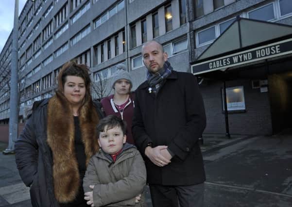 Faune Reid and her son Jack, neighbour Michelle Manson and MSP Ben McPherson. Picture; Neil Hanna