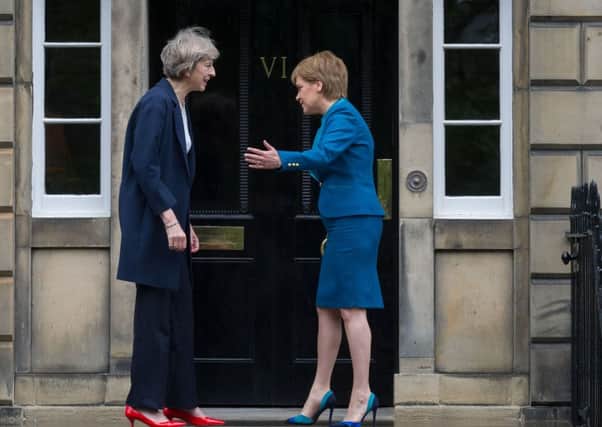 Downing Street insiders say Theresa May is worried Nicola Sturgeon will call for another referendum at the SNP conference next month. Picture: Steven Scott Taylor / J P License