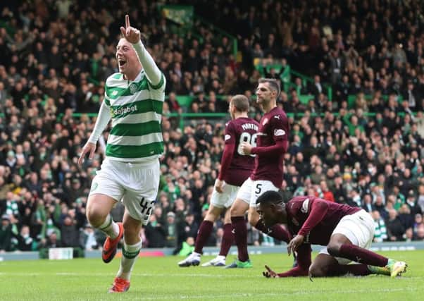 Callum McGregor celebrates scoring the opening goal for Celtic