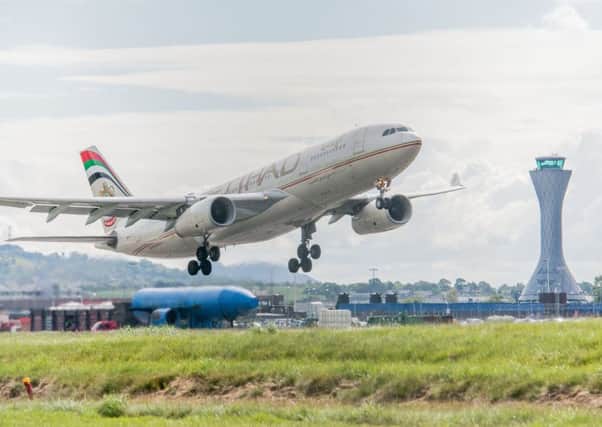 .An Etihad flight takes off from Edinburgh Airport. Picture: Ian Georgeson
