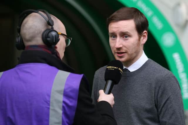 Heart's manager Ian Cathro being interviewed before the defeat at Celtic Park on Sunday. Picture: PA