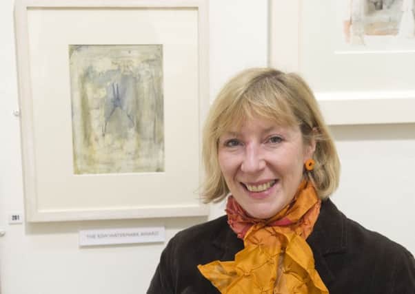 Alison Stewart, winner of the RSW Watercolour award, with her winning painting. Photo: Chris Watt