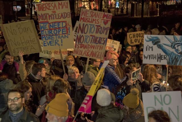 Anti Trump protesters in Edinburgh made hundreds of banners. Picture: Andrew O'Brien