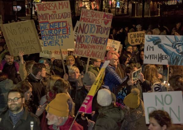 Anti Trump protesters in Edinburgh made hundreds of banners. Picture: Andrew O'Brien