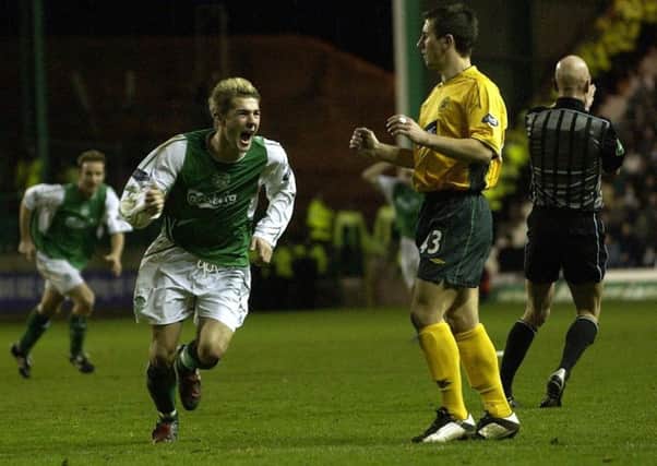 Kevin Thomson celebrates scoring the winning goal against Celtic in the quarter-finals of the CIS Cup in 2003
