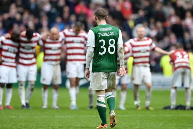 Thomson hangs his head after missing in the play-off shoot-out against Hamilton in 2014