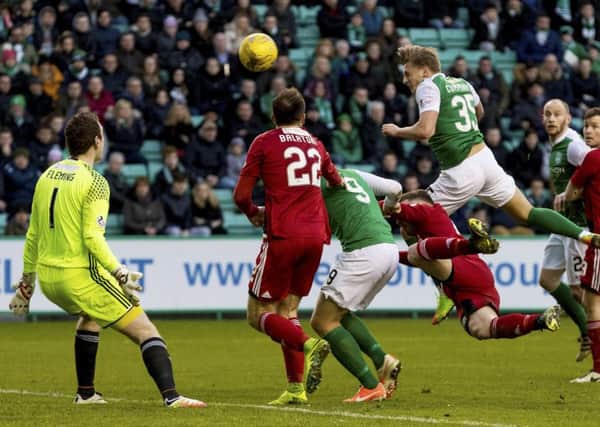 Jason Cummings provides the finishing touch to a James Keatings cross and salvages a point for Hibs
