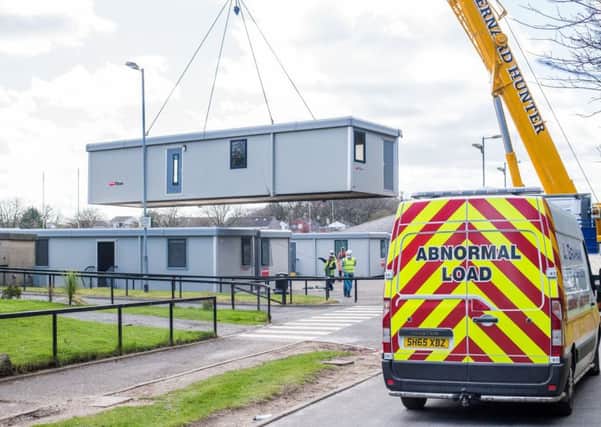 Portacabin classrooms arrive at 
The Royal High School. Picture: Ian Georgeson