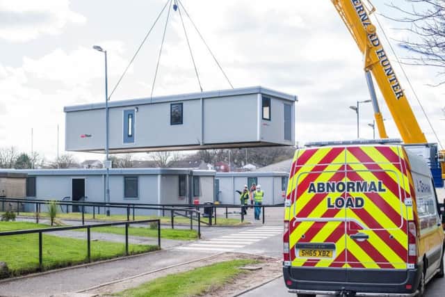 Portacabin classrooms arrive at
The Royal High School. Picture: Ian Georgeson